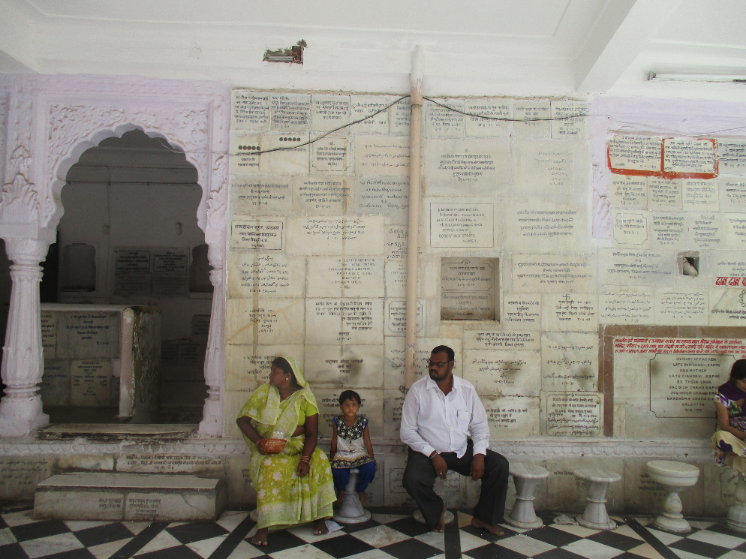 The temple is covered in inscriptions memorialising family members. 