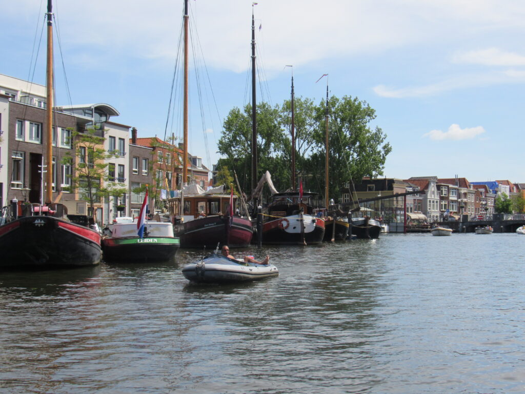 old boats along city waterfront