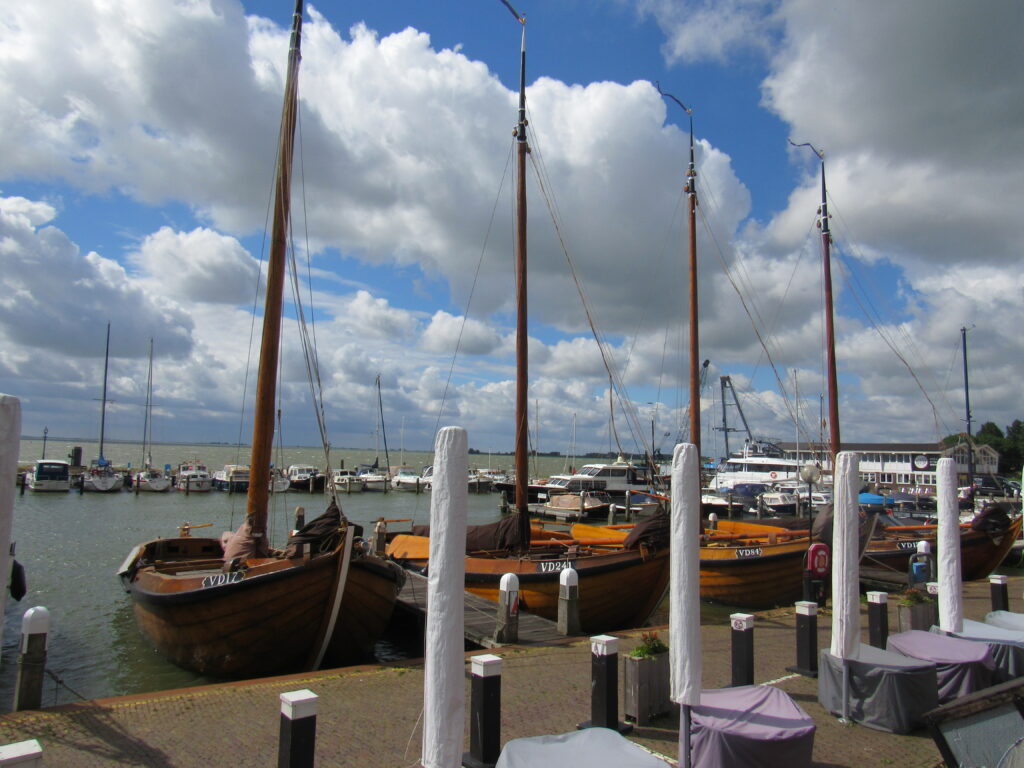 Row of old boats at wharf