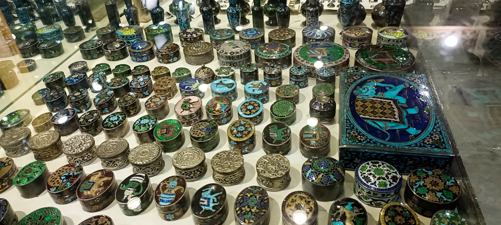 Rows of coloured decorative containers