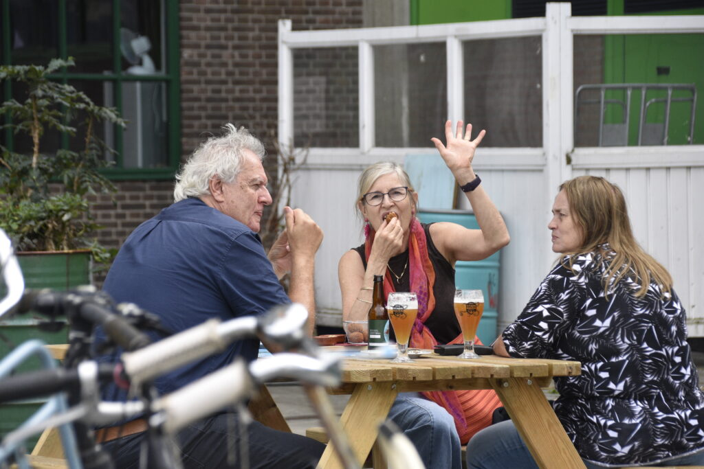 WOman wavin g to camera